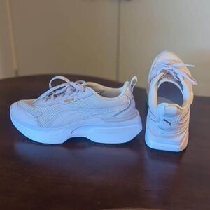 Purple puma sneakers